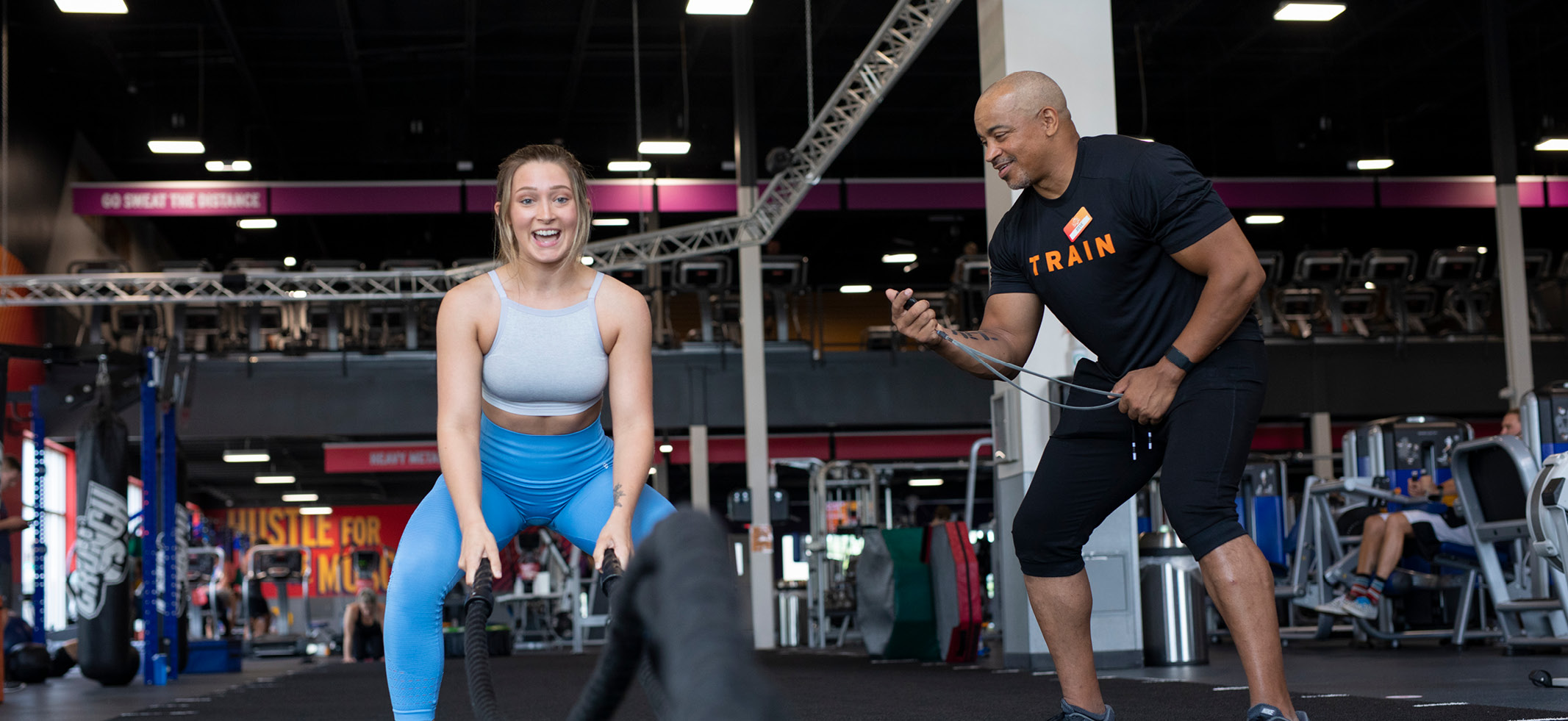 woman working out with personal trainer
