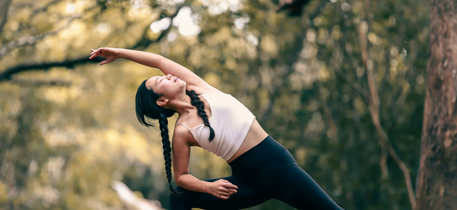 person stretching outdoors